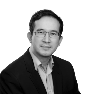 Headshot of Paul Lanois, greyscale