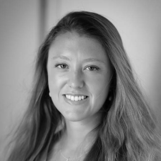 Headshot of Natalia Demora, greyscale